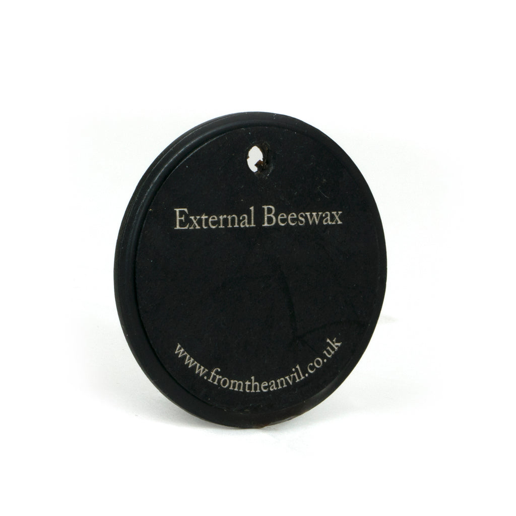 White background image of From The Anvil's External Beeswax finish swatch