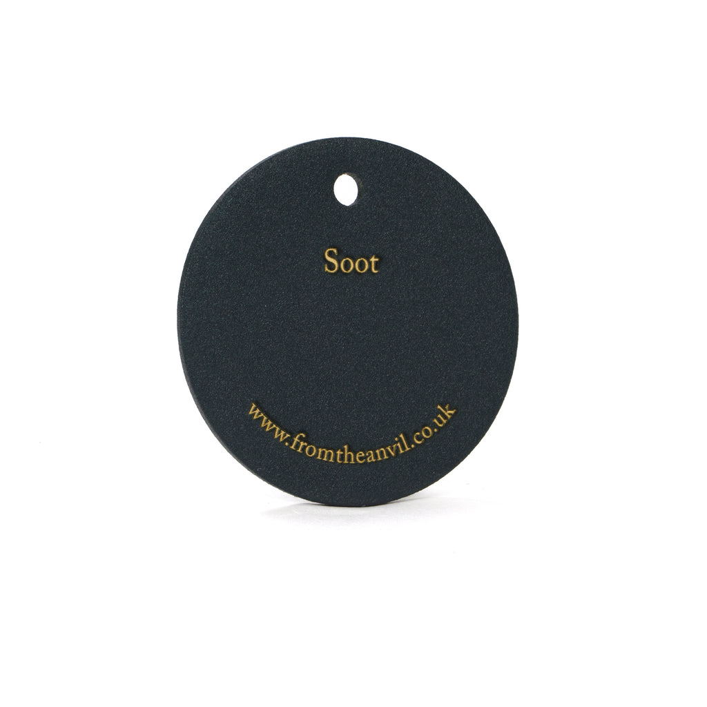 White background image of From The Anvil's Soot finish swatch